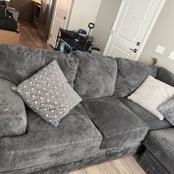 Grey Sectional with ottoman