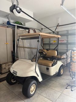 E-Z-GO TXT 48V Lithium Golf Cart – 4 Passenger