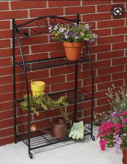Best Garden Brand New ( In the box) 3 Shelf Plant Stand With Leaf Patter