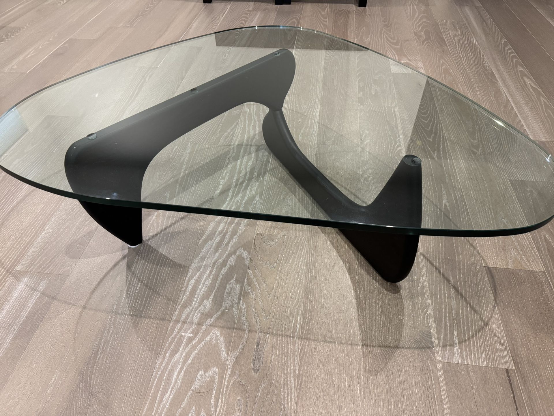 Modern Glass Coffee Table with Black Sculptural Base