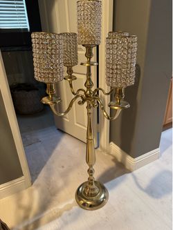 Elegant Five-Arm Crystal Candelabra – Gold Finish Add timeless elegance and luxury to your home or event with this stunning five-arm crystal candelab