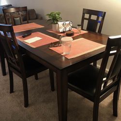Dining Table And Four Chairs 