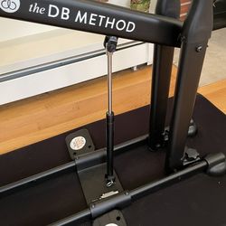 DB Method Squat Machine