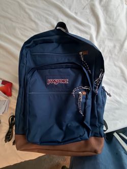 JanSport Navy Blue Backpack with Leather Bottom