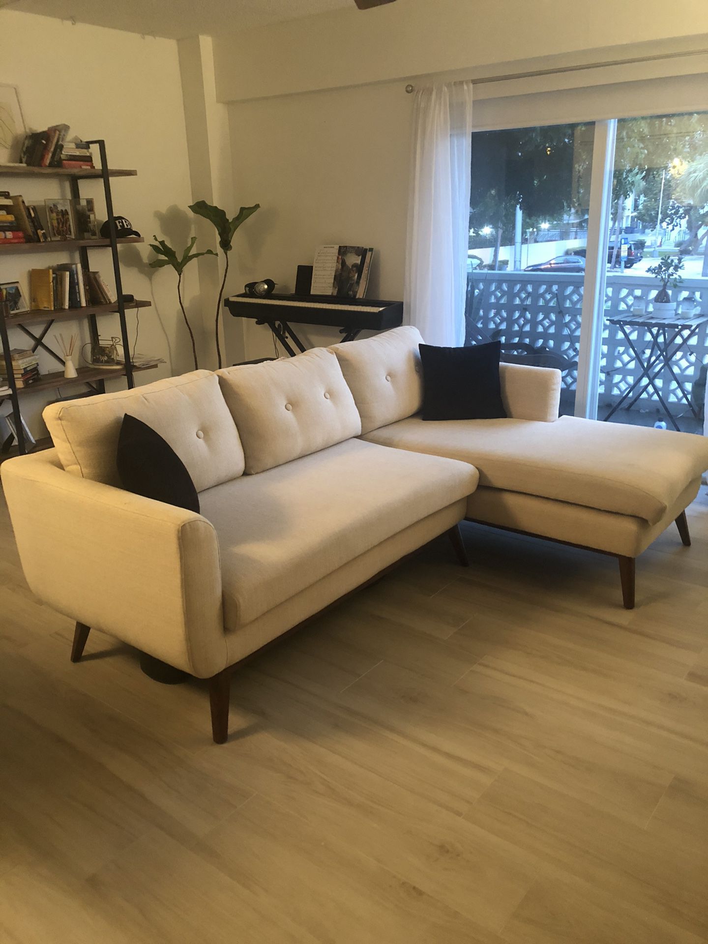 Beige and wooden sectional sofa