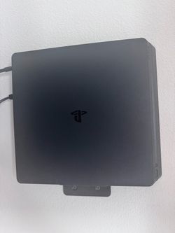 Sony PlayStation 4 Slim Console + games and controllers