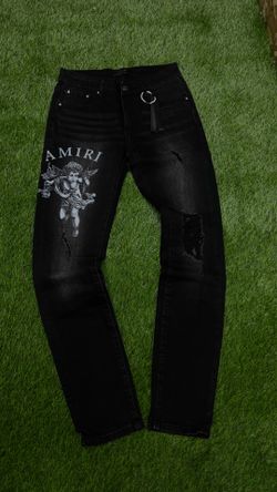 Amiri and purple jeans