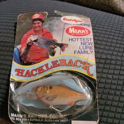 Mann's Bait Company "Hackleback" fishing lure, 