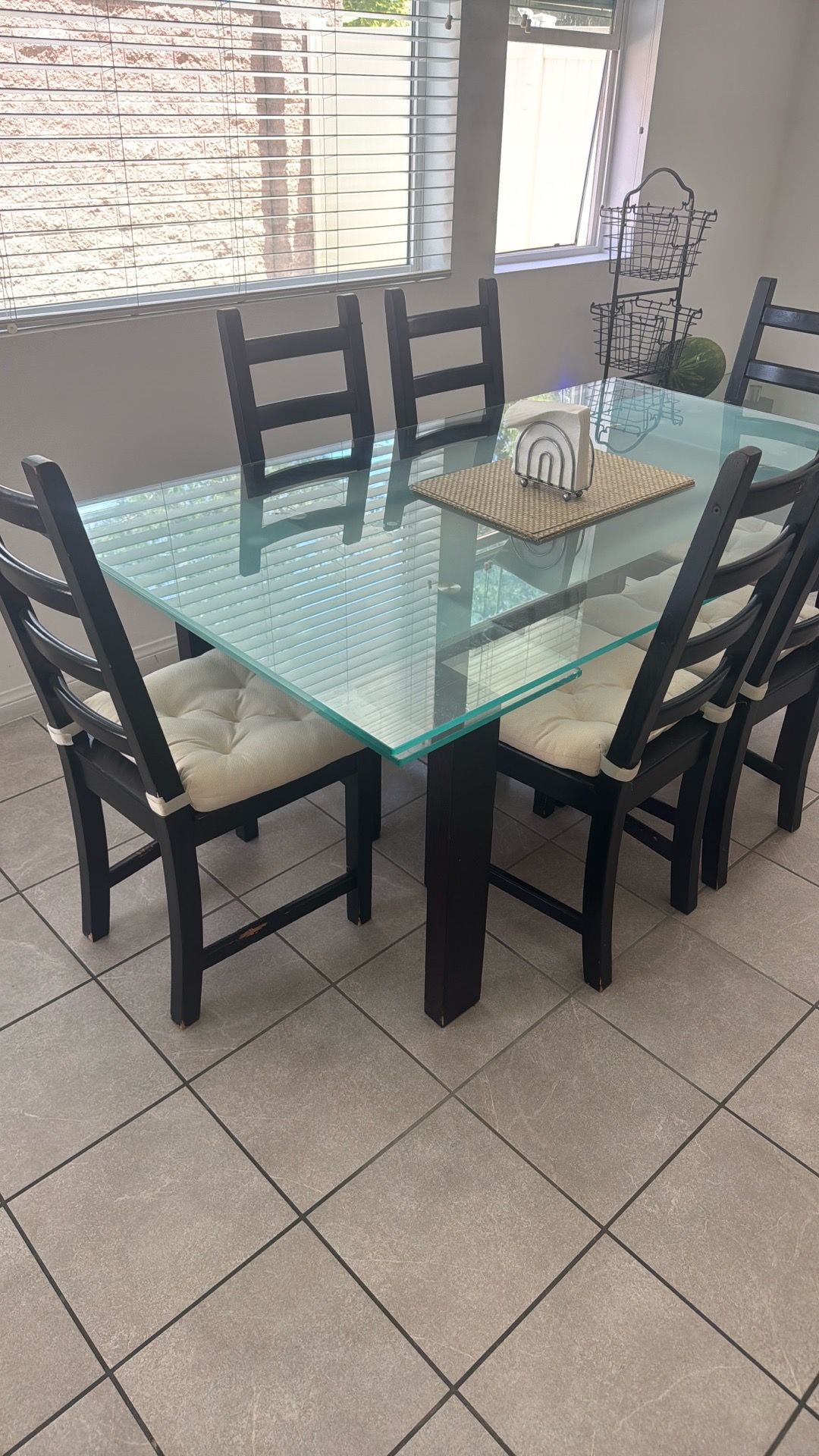 Dining table with chairs and a side table