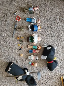 Family guy figures and stuffed animals.