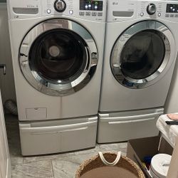 LG washer And Dryer Set With Pedestal Drawers
