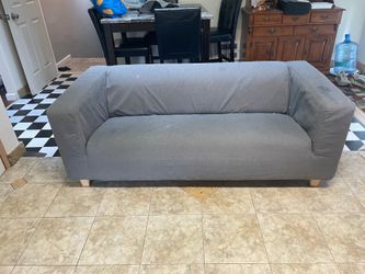 Small sofa with slipcover