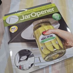 New easy jar opener. Open any size jar cap. 