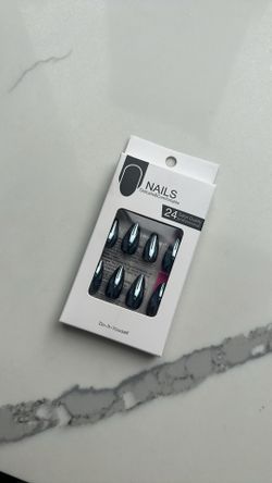 24 pieces nails with a glue sticks . new