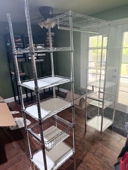 Adjustable metal closet unit