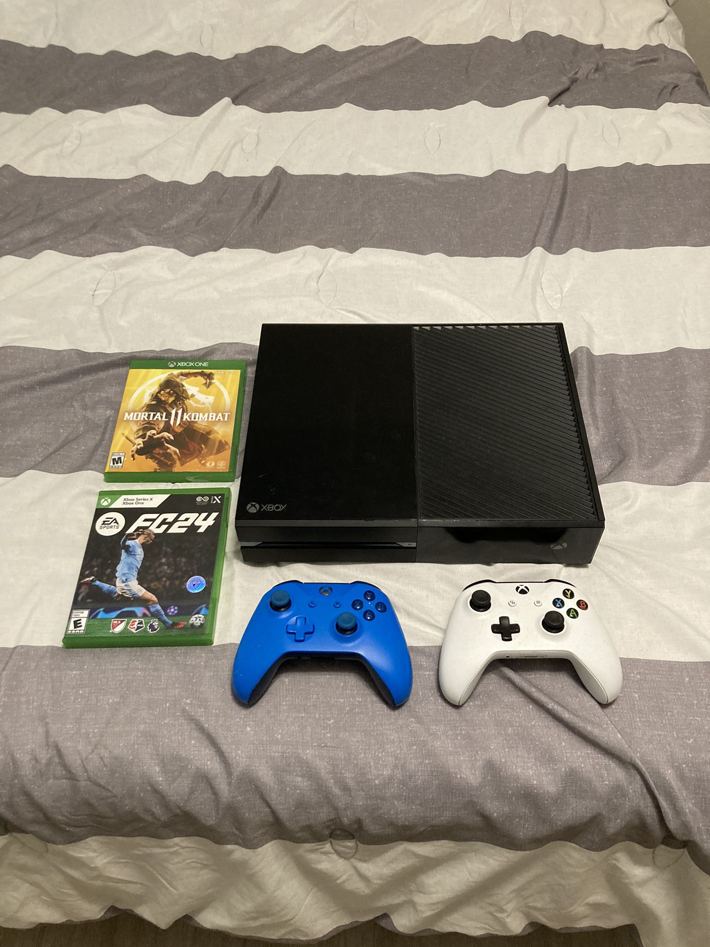 xbox one 1TB with 2 controllers and 2 games