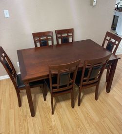 7-PC DARK BROWN FINISH DINING SET (1 DINING TABLE AND 6 PADDED CHAIRS)