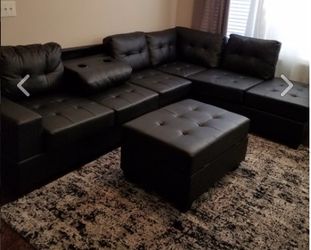 New Black Sectional with Storage Ottoman