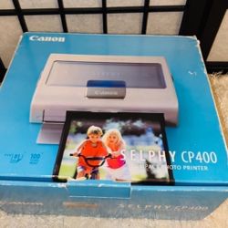 Canon selphy Cp400 with extras 