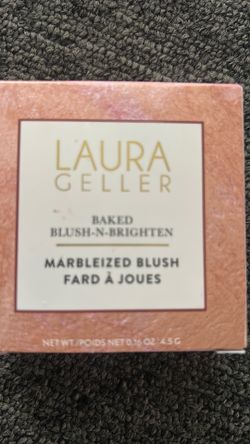 LAURA. GELLER
