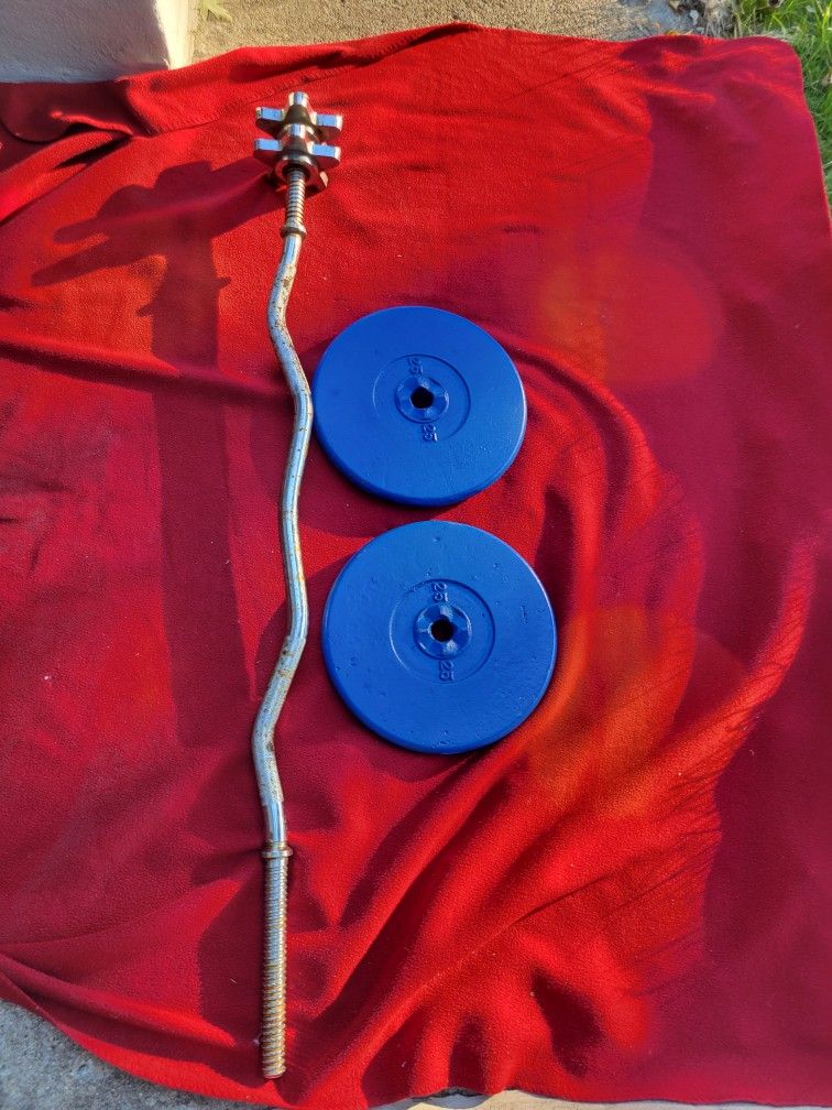 1" HOLE EZ-CURL BAR WITH 50LBs
2-25s.
116TH S HALSTED. DELIVERY AVAILABLE
$65. CASH ONLY AS IS