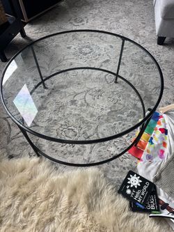 Black round glass coffee table