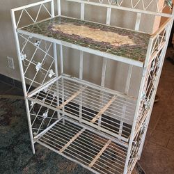 Rod iron shelf for plants