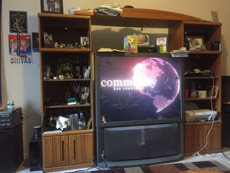 Entreteinment center and a 55” tv fare condition