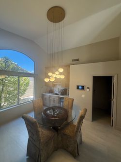 Title: Round Glass-Top Kitchen Table Set with 4 Upholstered Chairs