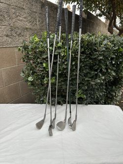 6 golf clubs