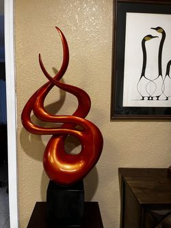 Red Sculpture With A Black Base… 41.5” Height By 20” Wide… $165