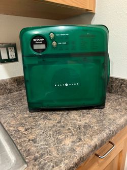 Green cute small microwave