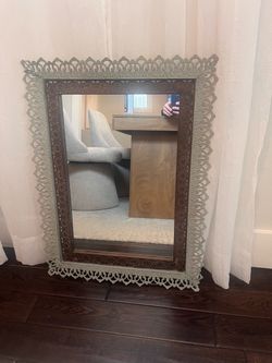 Decorative Wall Mirror with Ornate Metal Frame
