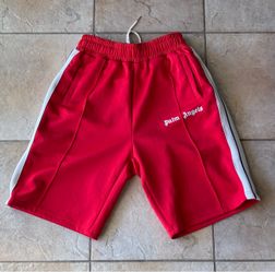 Red shorts with white stripes