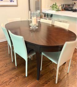 Wood dining room table with extension leaf and 6 dining room chairs