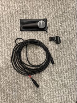 Shure SM58 with pouch, clip, and mic cable (XLR)