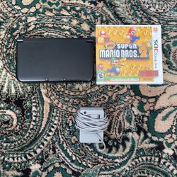Black 3DS XL with Stylus and Super Mario Bros Included. USB To DS Cable Included