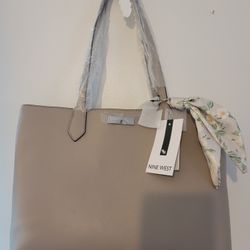 NEW PURSE NEVER OPEN OR USE BY NINE WEST