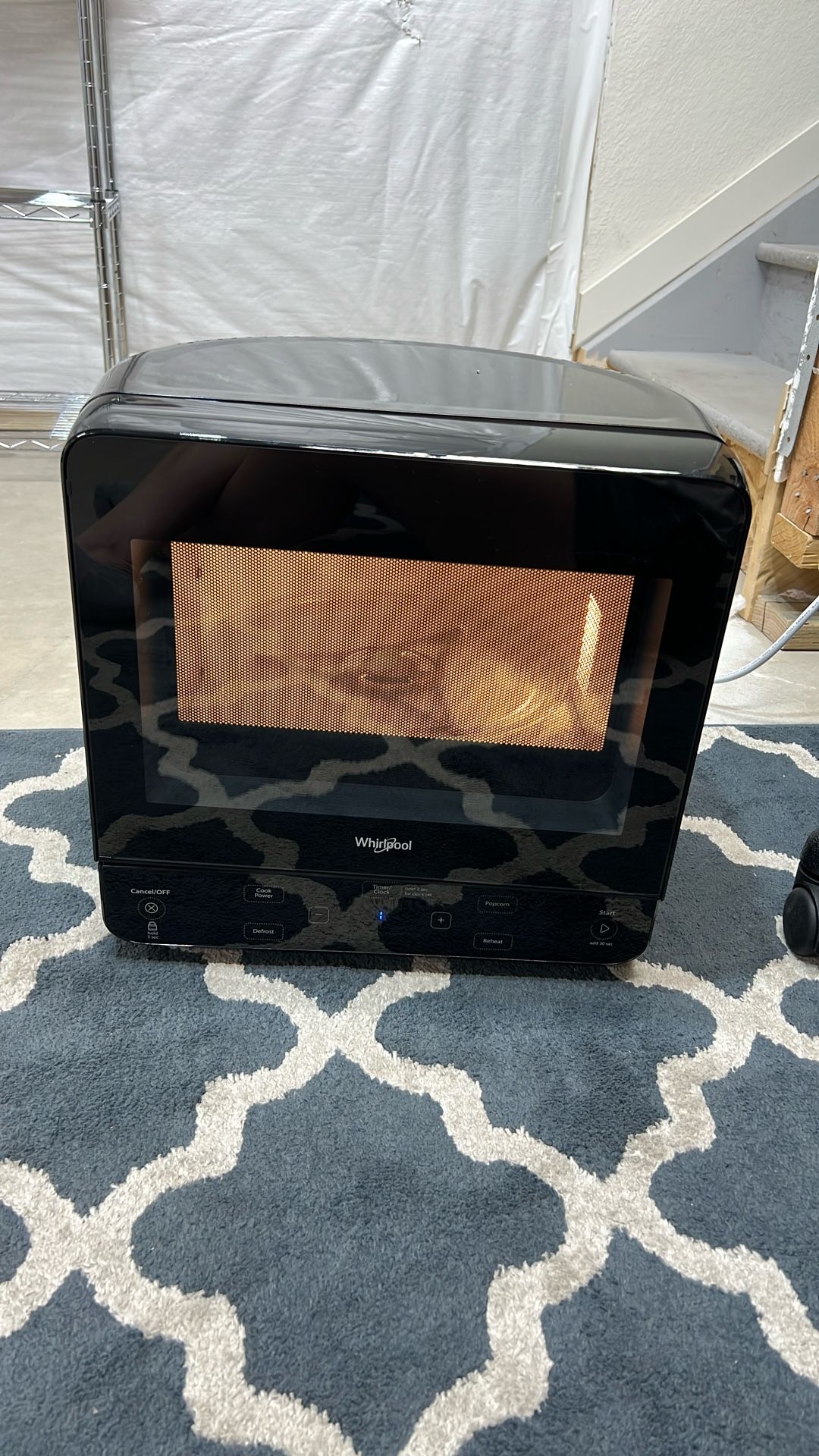 Smal 1/2 circle Whirlpool microwave