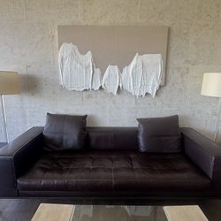 Maxalto Simplice Sofa With Dark Leather And A Bronze Base