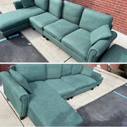 green woven fabric couch