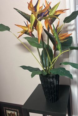 Small wooden table $15, artificial Bird of Paradise plant $35