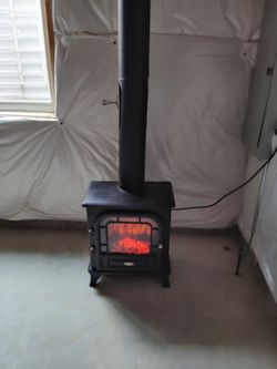 Beautiful antique electric Franklin Stove fireplace