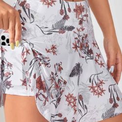 WOMENS 2 IN 1 SKIRTS AND SHORTS.  (NEED TO BE GONE)