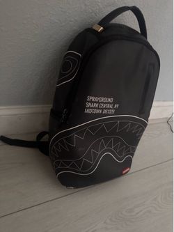 Backpack spray ground