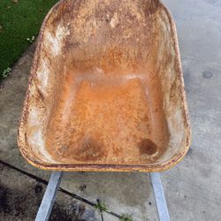 wheel barrow/ carretilla de rueda