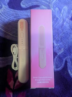 Pink wireless straight hair comb