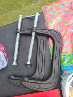 BRAND NEW HUSKYS QUICK RELEASE CLAMPS.. AS IN PICTURES.. 45 EACH OR BOTH FOR 80 DOLLARS.. CHECK OUT MY PAGE FOR MORE..