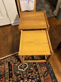 Set of two wooden side tables in excellent condition. 17 7/8” square x 17 1/4” H/15 3/4” square by 15 3/4” H