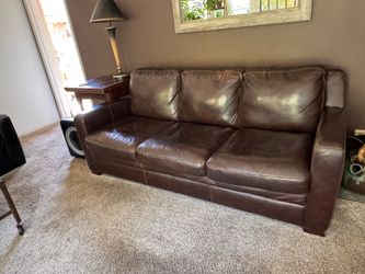 Brown leather 9’ sofa with queen pullout